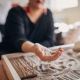Person with sand tray